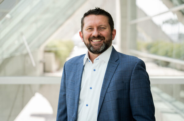 Shawn VanDiver headshot, plaid blazer, San Diego Convention Center